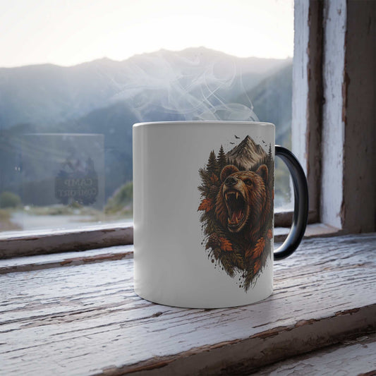 "The Color-Changing Coffee Mug | Rustic Bear Forest Design (11 oz) shown in mid-transformation, revealing a bear and forest graphic as hot coffee is poured in."