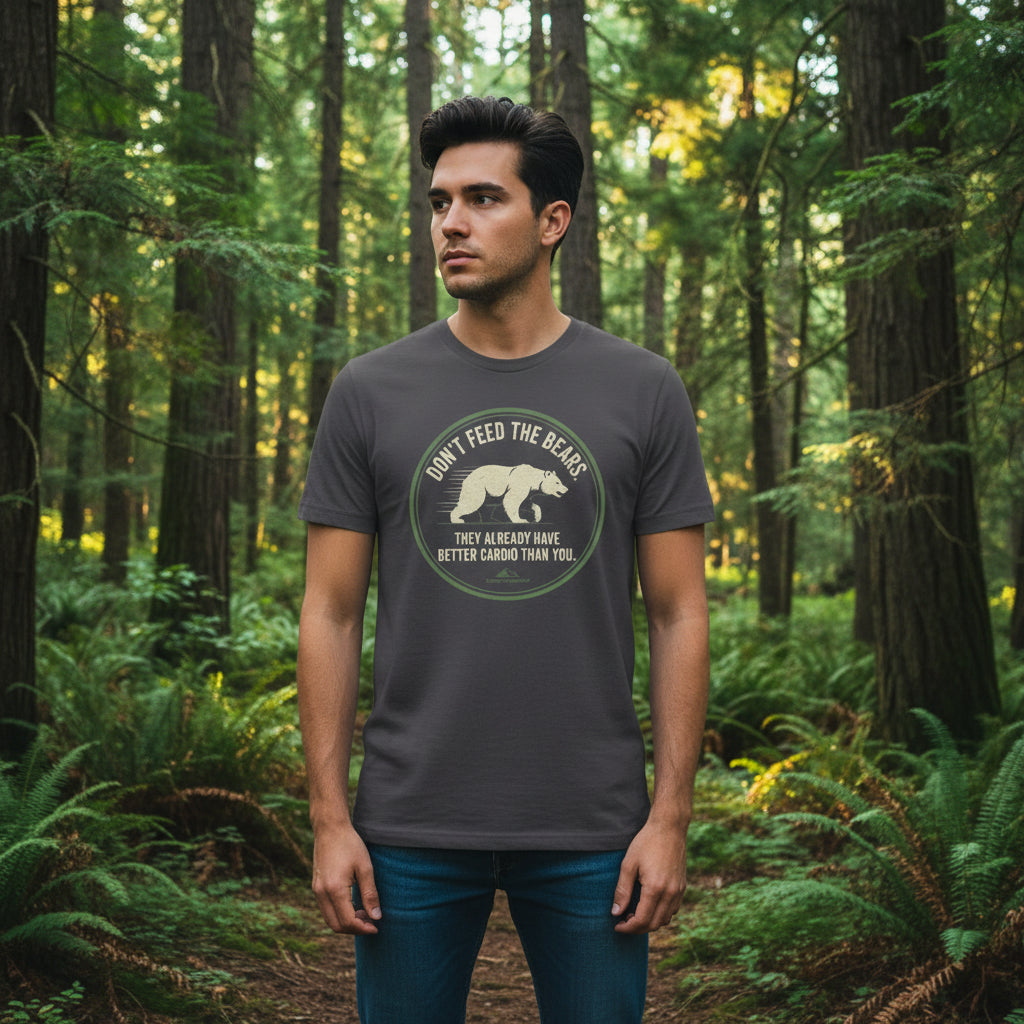 A vintage-style Don't Feed the Bears graphic t-shirt in a charcoal grey, featuring a bold bear silhouette and classic park warning typography.