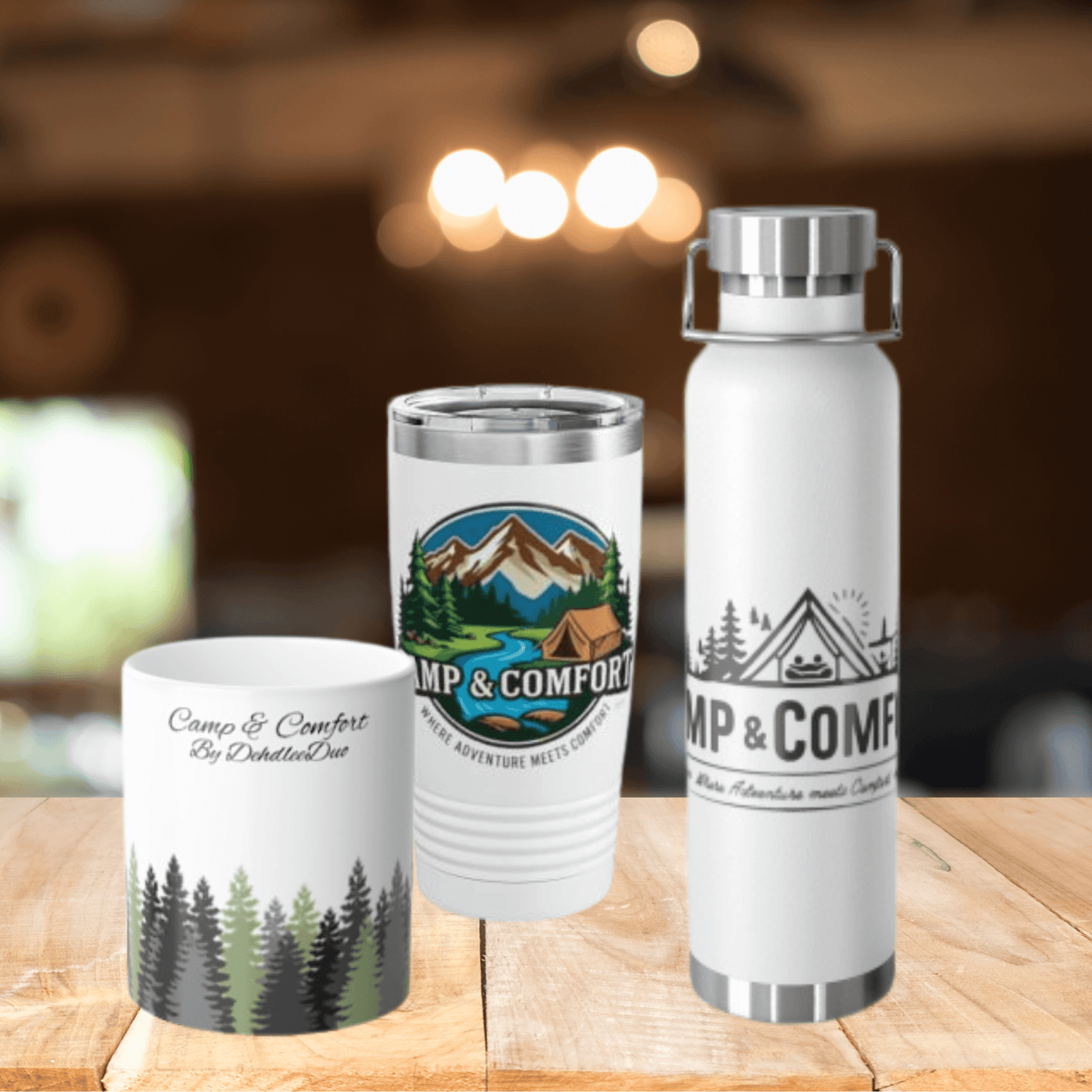 The All Drinkware Camping Mugs Outdoor Tumblers collection featuring a variety of insulated cups and rustic mugs displayed on a tailgate in the mountains.