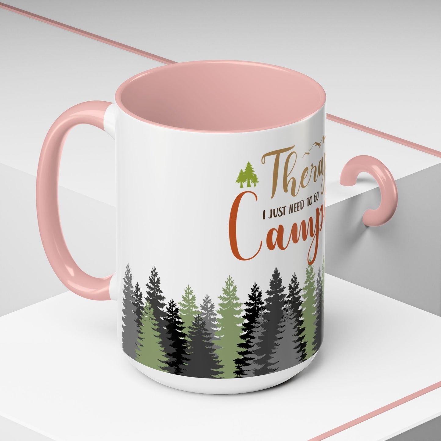 A person holding the I Don't Need Therapy I Just Need To Go Camping Mug next to a morning campfire.