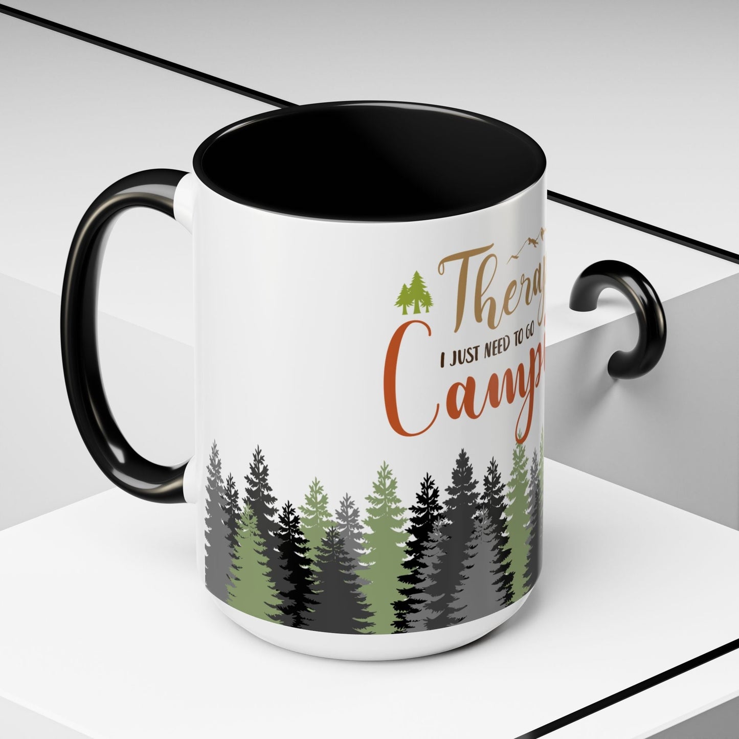 A person holding the I Don't Need Therapy I Just Need To Go Camping Mug next to a morning campfire.