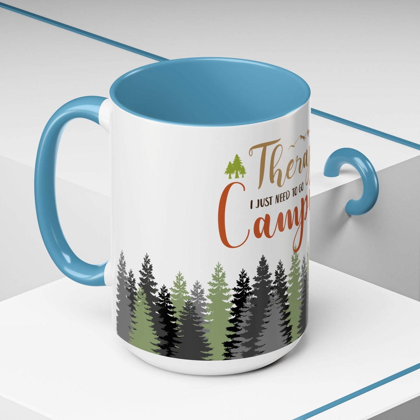 A person holding the I Don't Need Therapy I Just Need To Go Camping Mug next to a morning campfire.