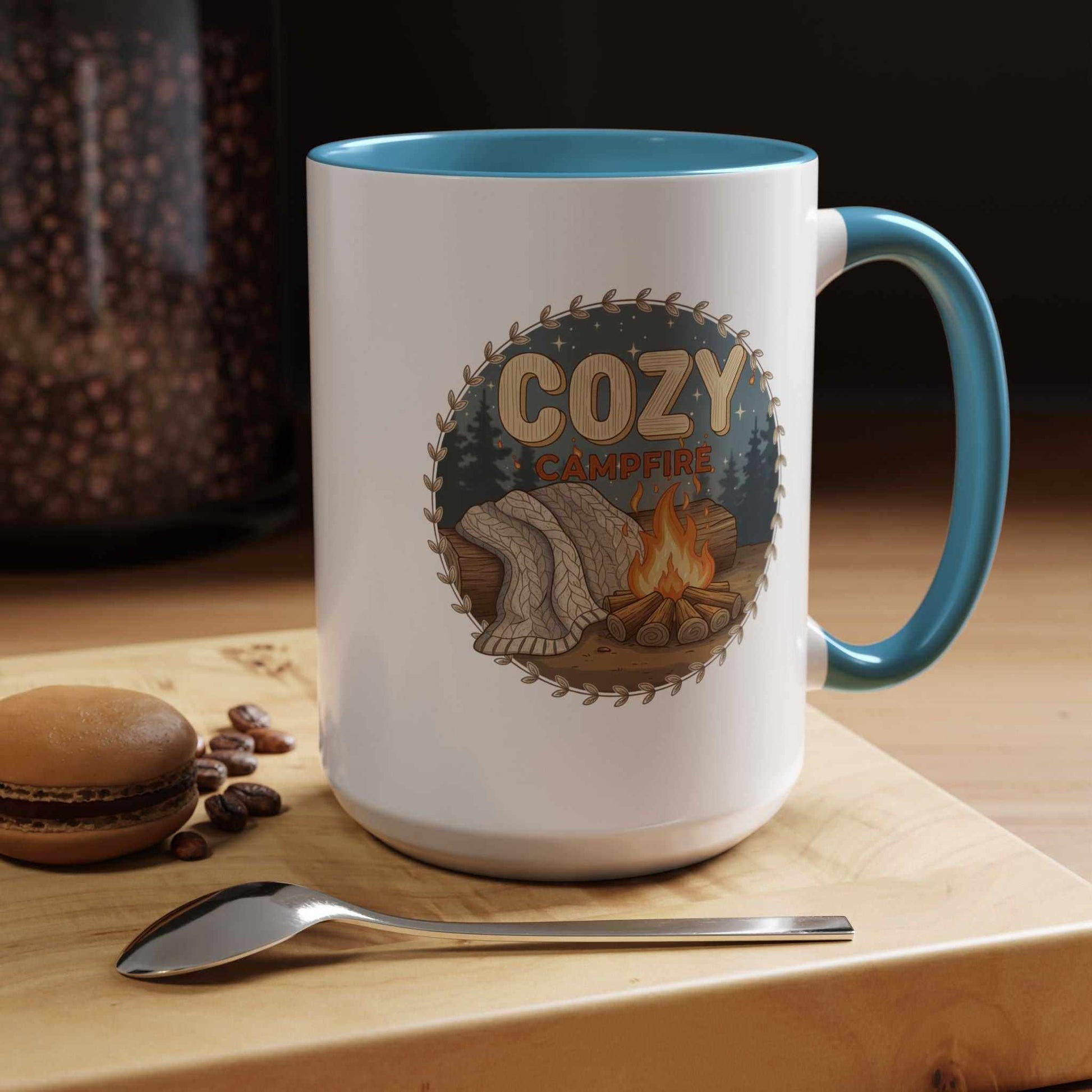 A Cozy Campfire Mug in speckled ceramic with a Sky rim, filled with hot coffee and sitting on a wooden surface