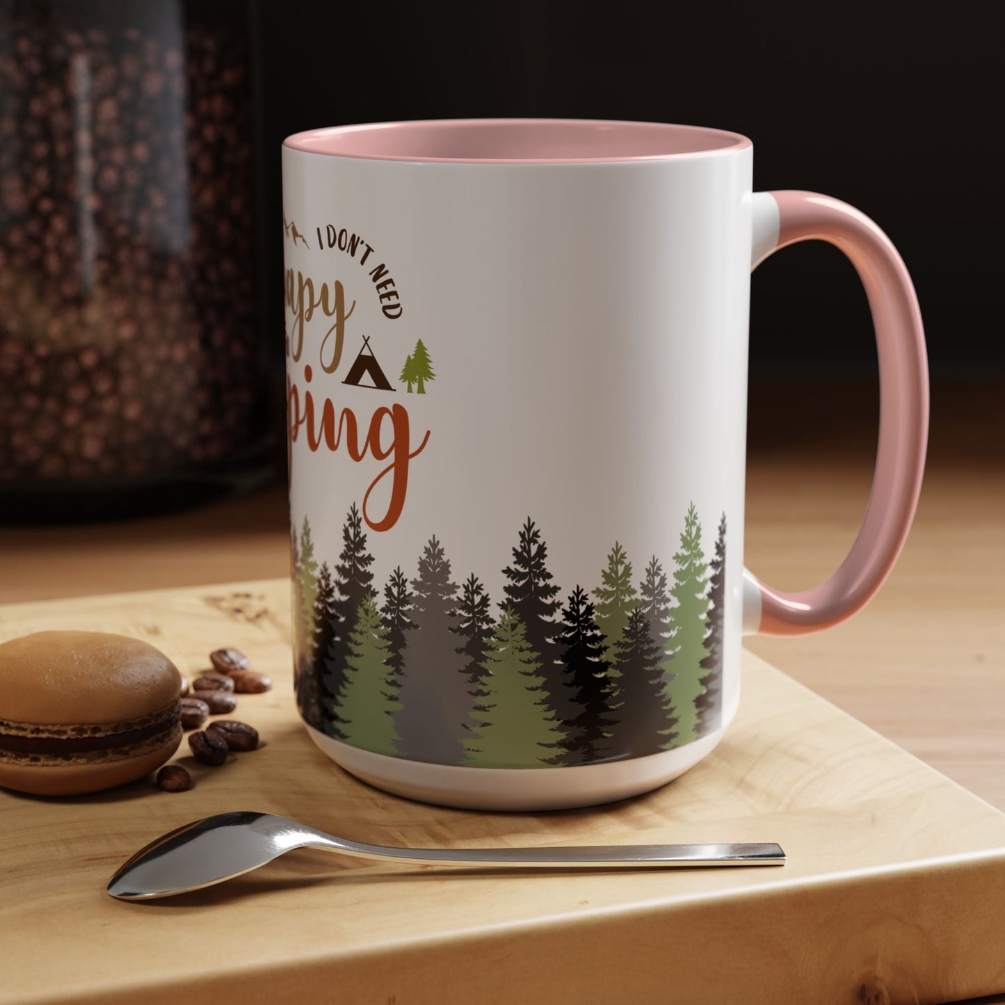 A person holding the I Don't Need Therapy I Just Need To Go Camping Mug next to a morning campfire.