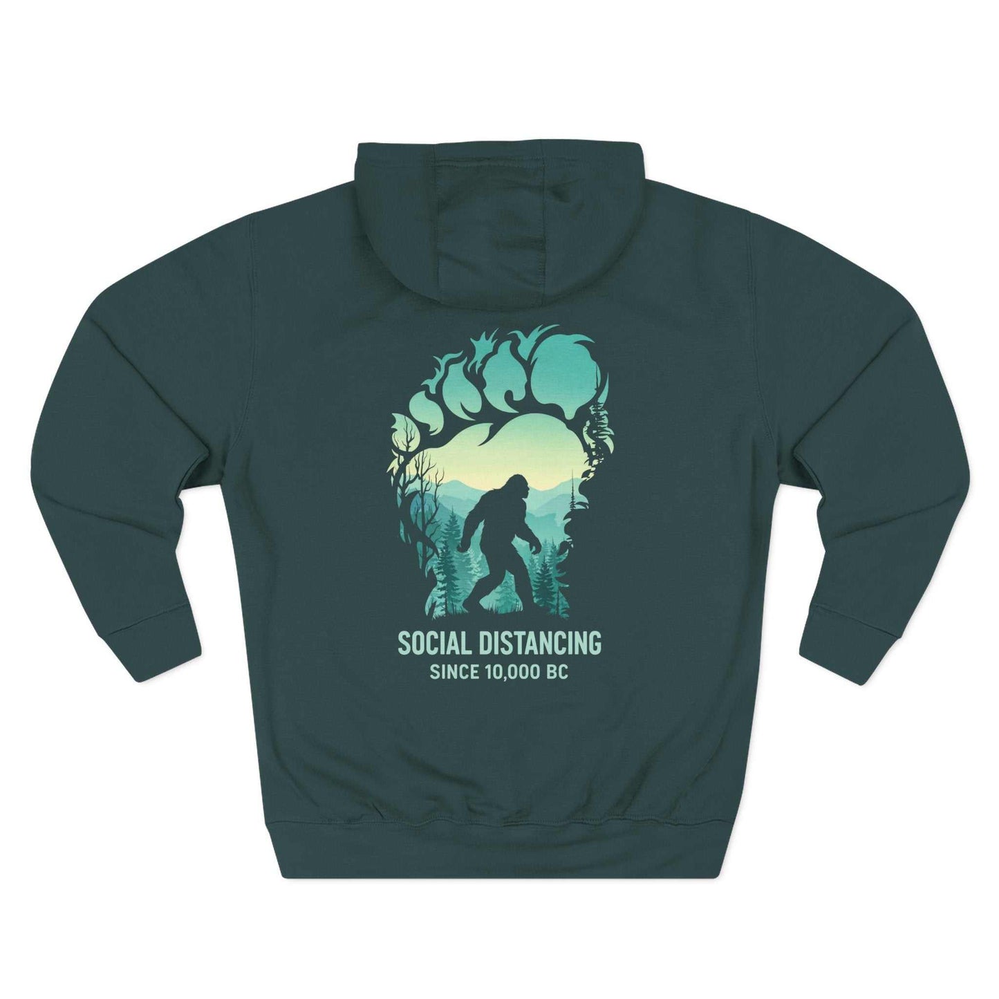 "The Bigfoot Social Distancing Hoodie in a cozy fleece pullover style, featuring a silhouette of Sasquatch and the text 'Social Distancing Since 10,000 BC'."
