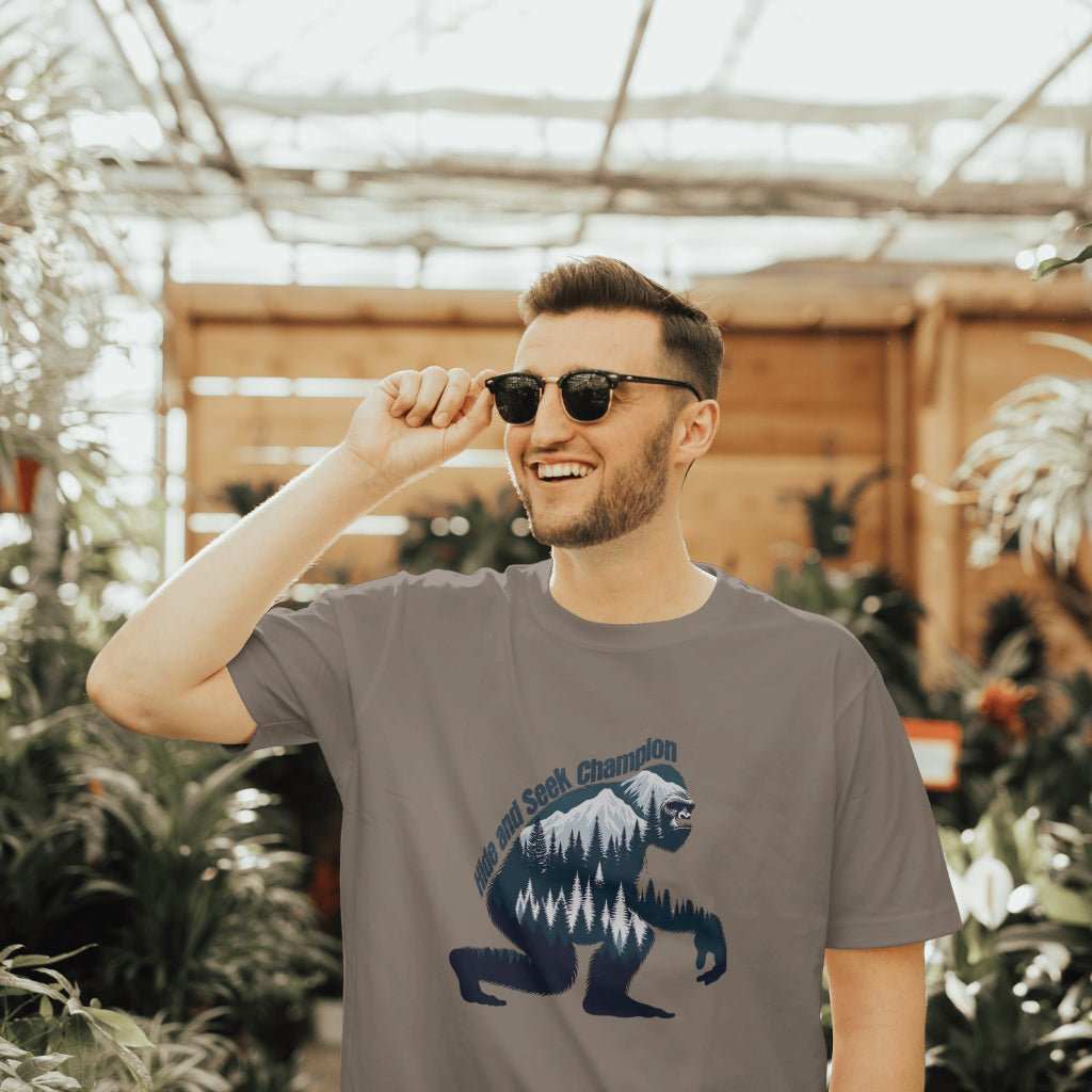 Bigfoot Hide and Seek Champion vintage graphic t-shirt in forest green for cryptid lovers and campers